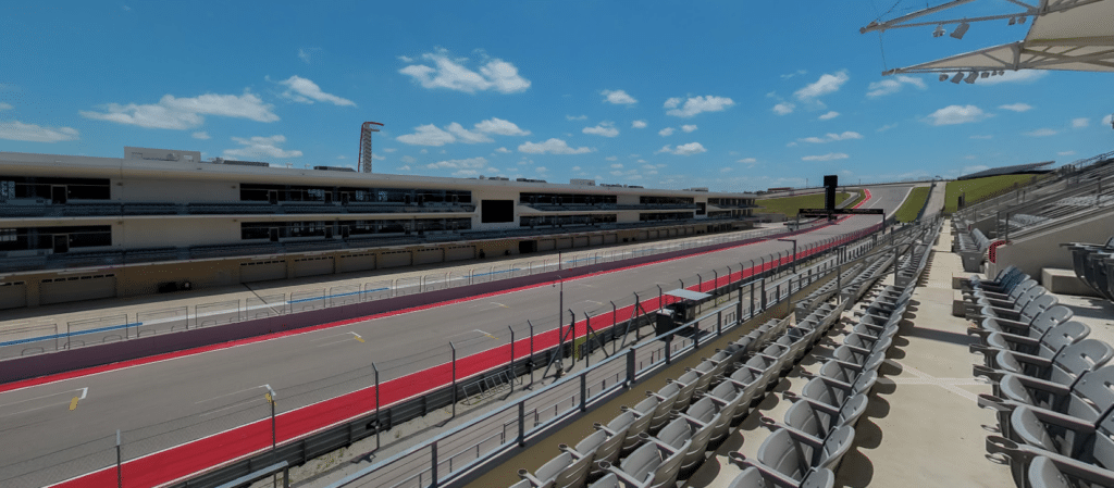 a view of COTA race track from the top Main staight grandstand