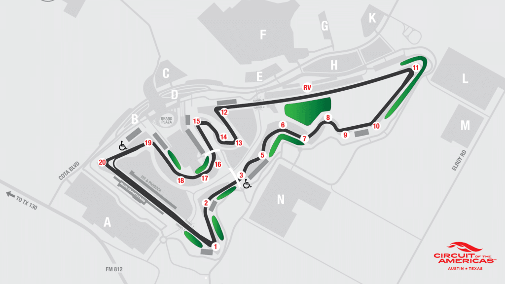 a map of a race track with a green arrow
