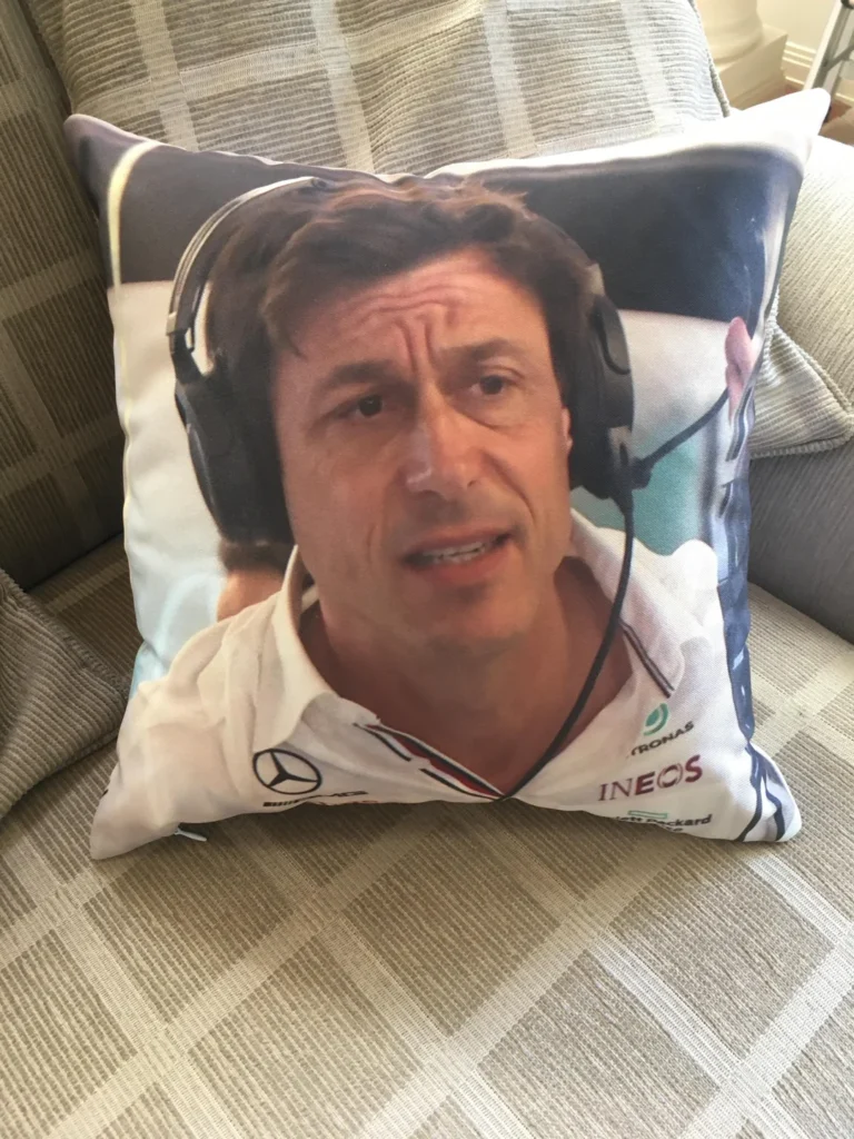 a pillow with a picture of a man wearing headphones