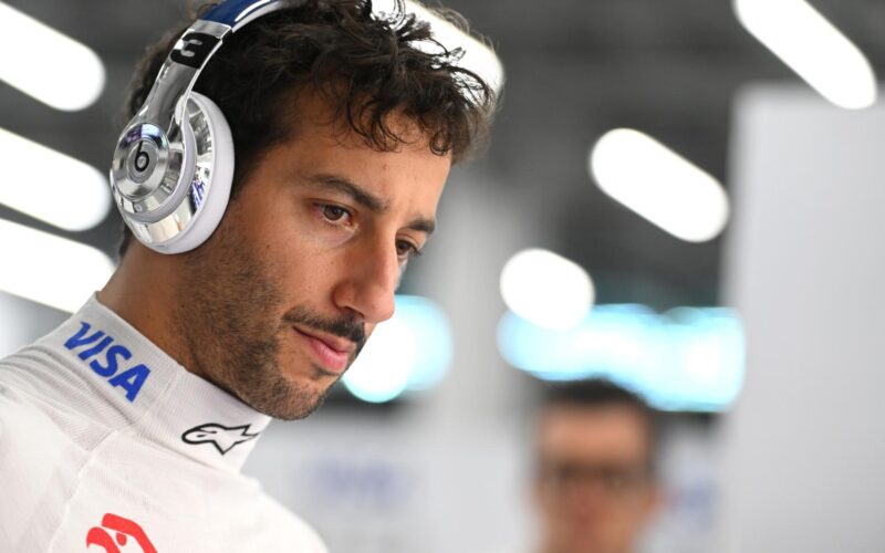 a man wearing headphones and a white shirt