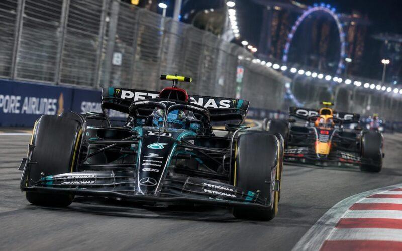 george russell sets the pace in singapore grand prix practice, while max verstappen impresses under the lights at marina bay.